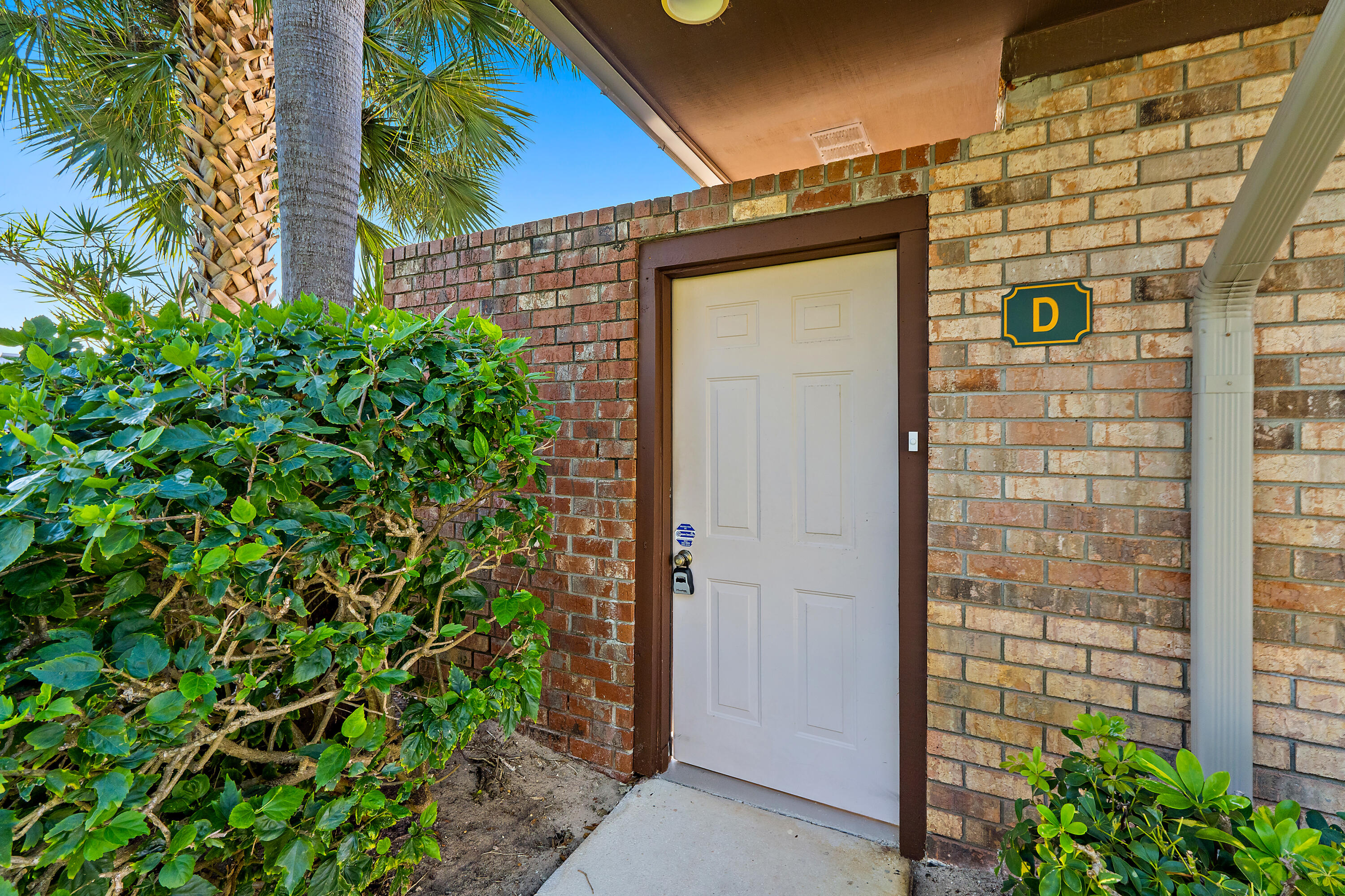 1420 Ocean Way, Unit 28D Jupiter, FL 33477 - Photo 32 of 33 view of front door of house