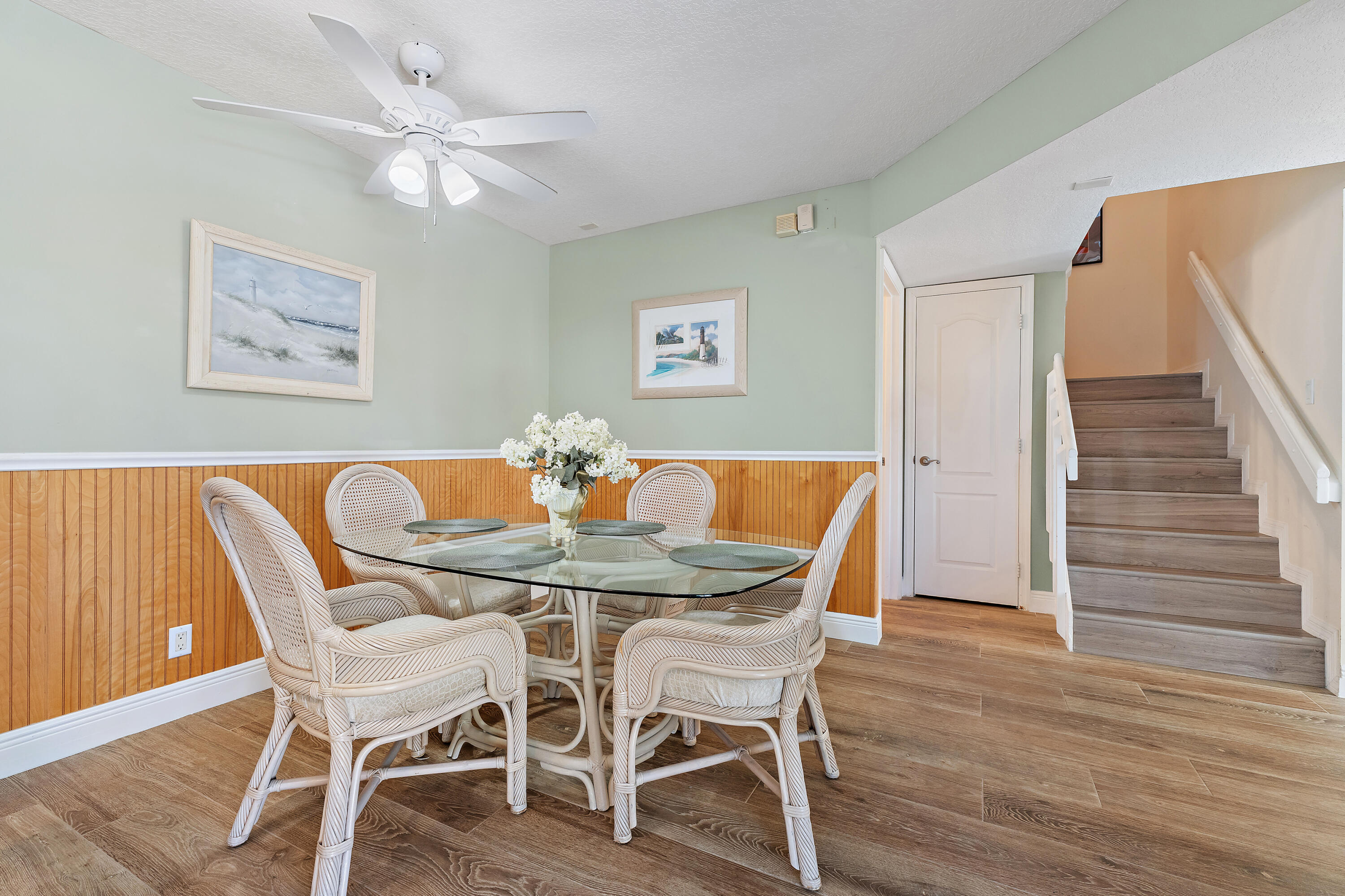 1420 Ocean Way, Unit 28D Jupiter, FL 33477 - Photo 10 of 33 a view of a dining room with furniture and wooden floor