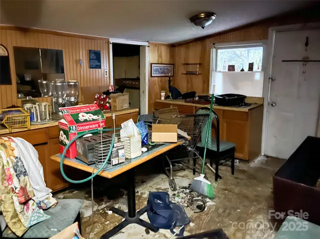 a living room with furniture piano and a flat screen tv