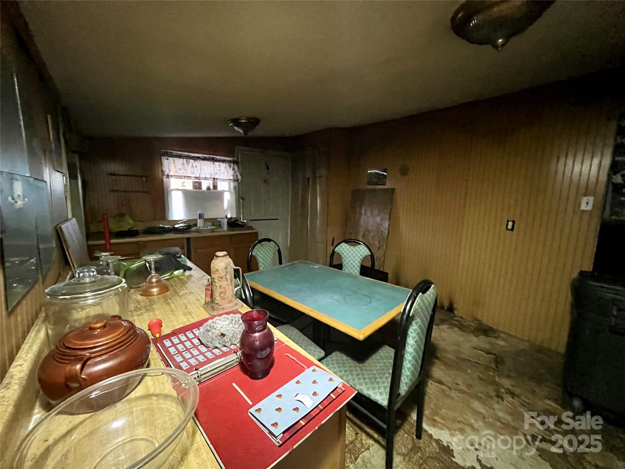 608 Crowders Creek Road Gastonia, NC 28052 - Photo 13 of 18 a room with furniture a flat screen tv and a window