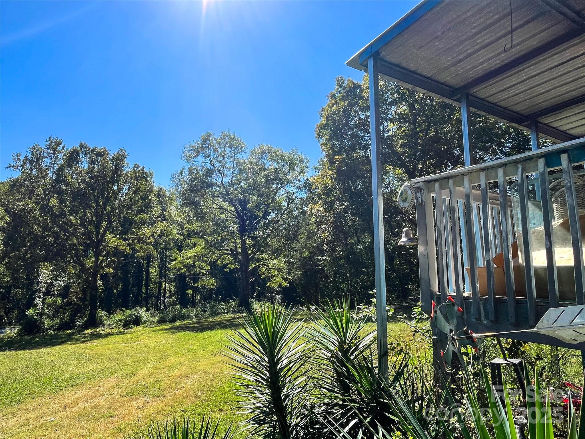 608 Crowders Creek Road Gastonia, NC 28052 - Photo 4 of 18 a view of a backyard with plants