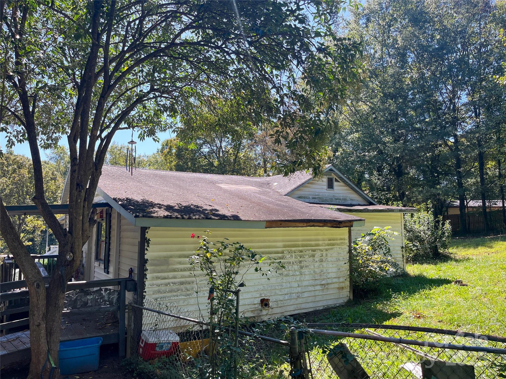 608 Crowders Creek Road Gastonia, NC 28052 - Photo 7 of 18 a view of a backyard with sitting area
