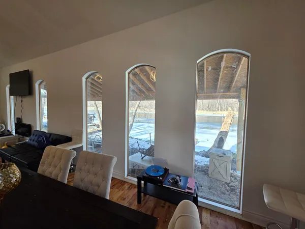 a living room with furniture and a window