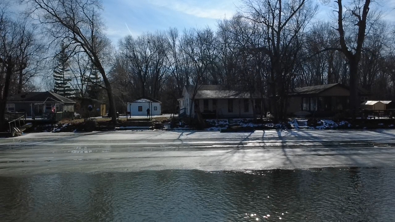 2709 North River Isle Road Momence, IL 60954 - Photo 16 of 23 a view of a fountain in the middle of a lake