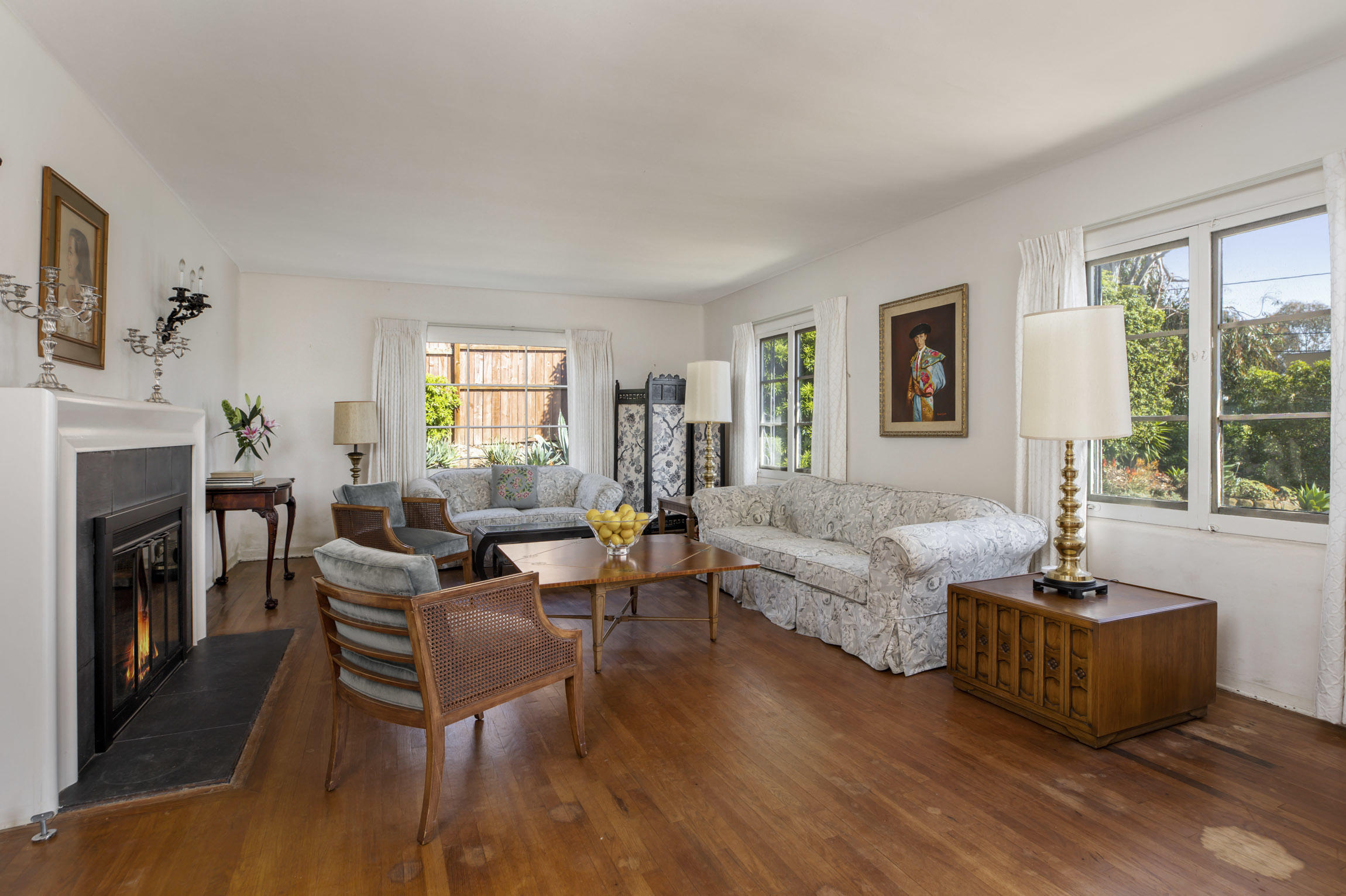 1126 Oriole Road Montecito, CA 93108 - Photo 5 of 18 a living room with fireplace furniture and a large window