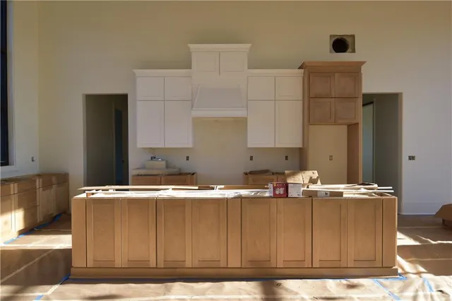 a view of a mini theater with a projector screen