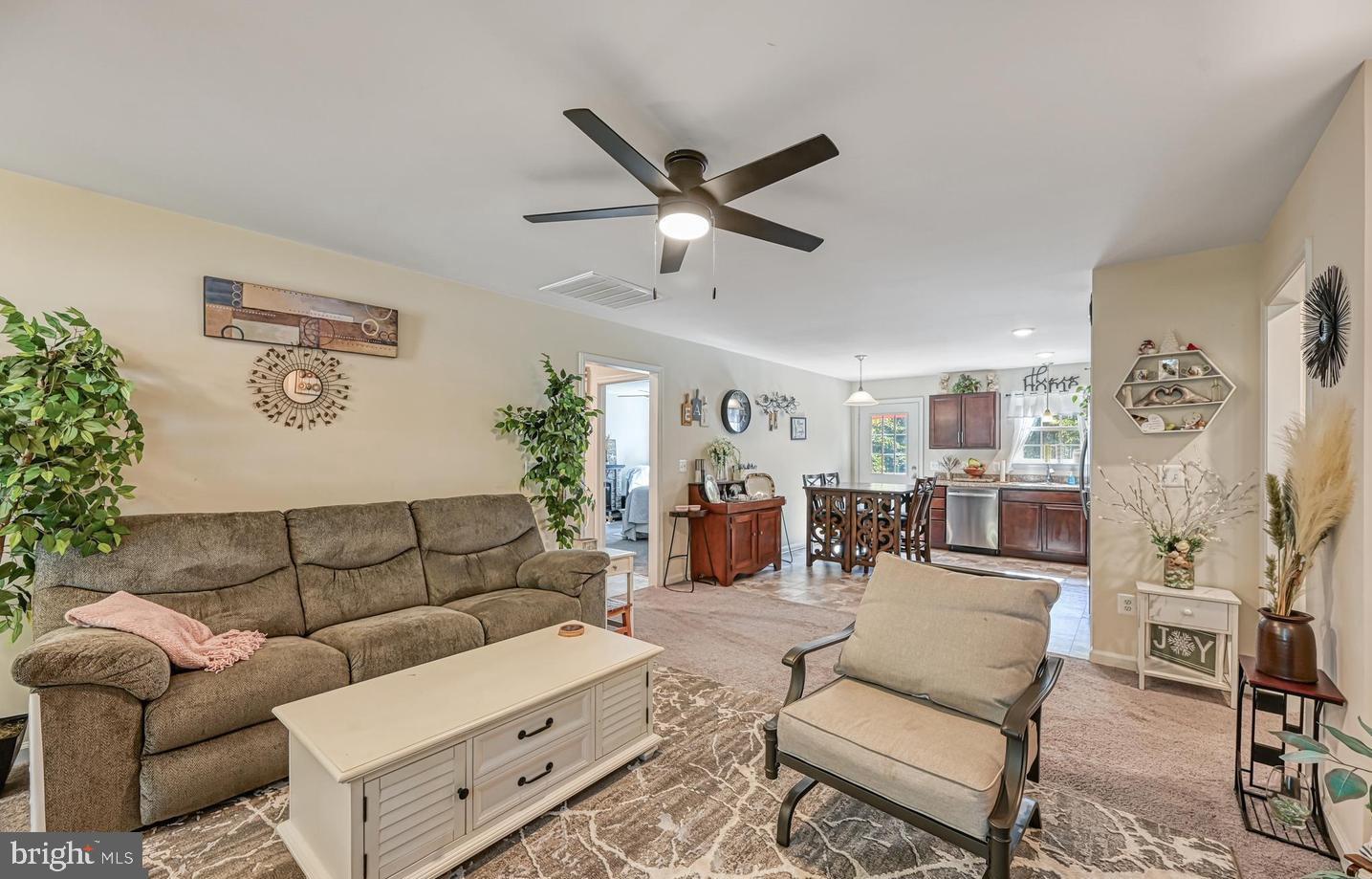 6121 Belmont Road Mineral, VA 23117 - Photo 12 of 32 a living room with furniture and white walls