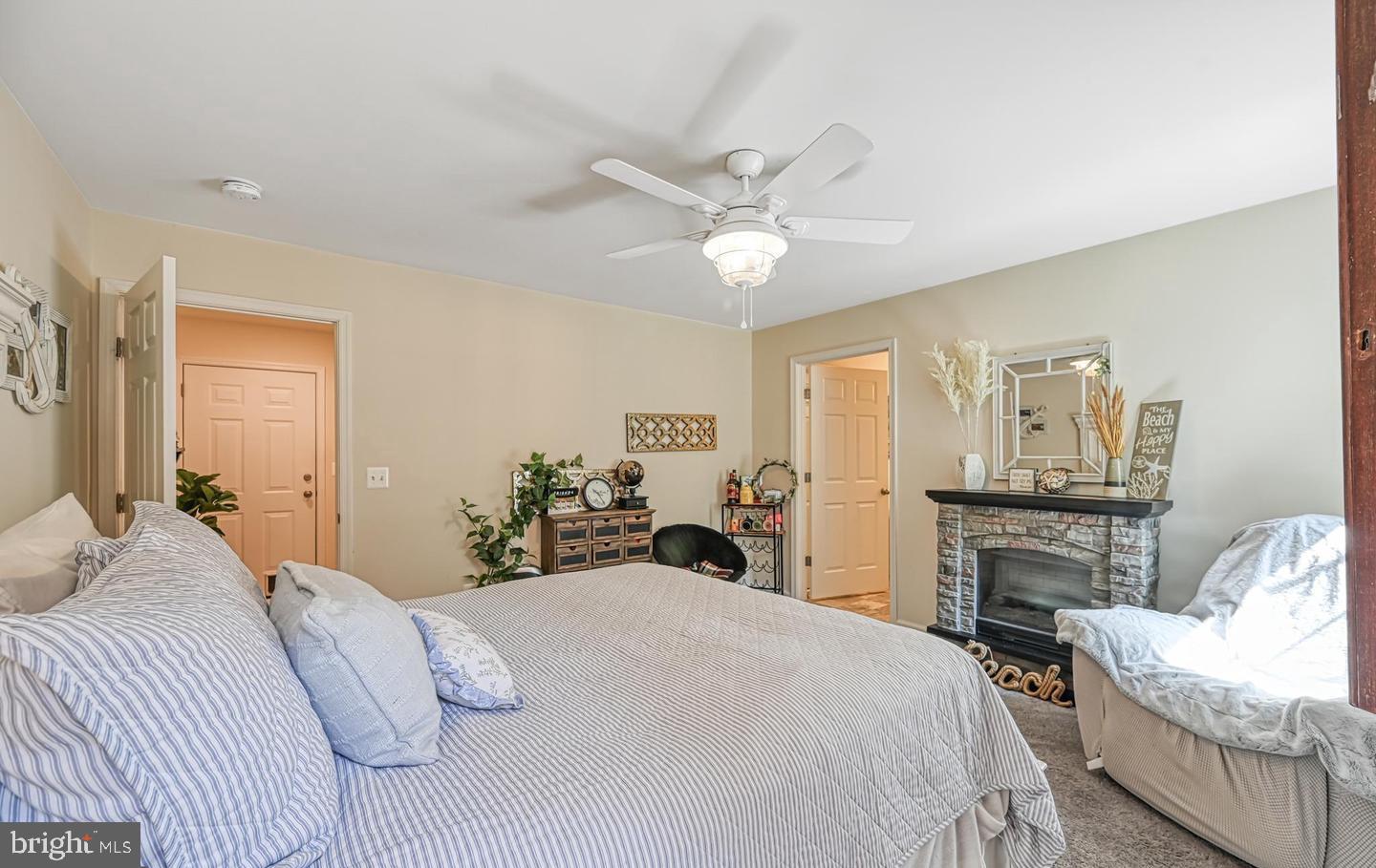 6121 Belmont Road Mineral, VA 23117 - Photo 17 of 32 a bedroom with a bed and wooden floor