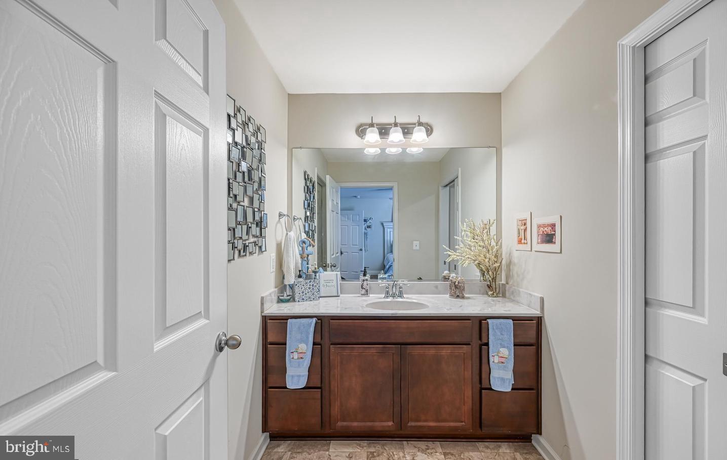 6121 Belmont Road Mineral, VA 23117 - Photo 19 of 32 a bathroom with a sink and a mirror