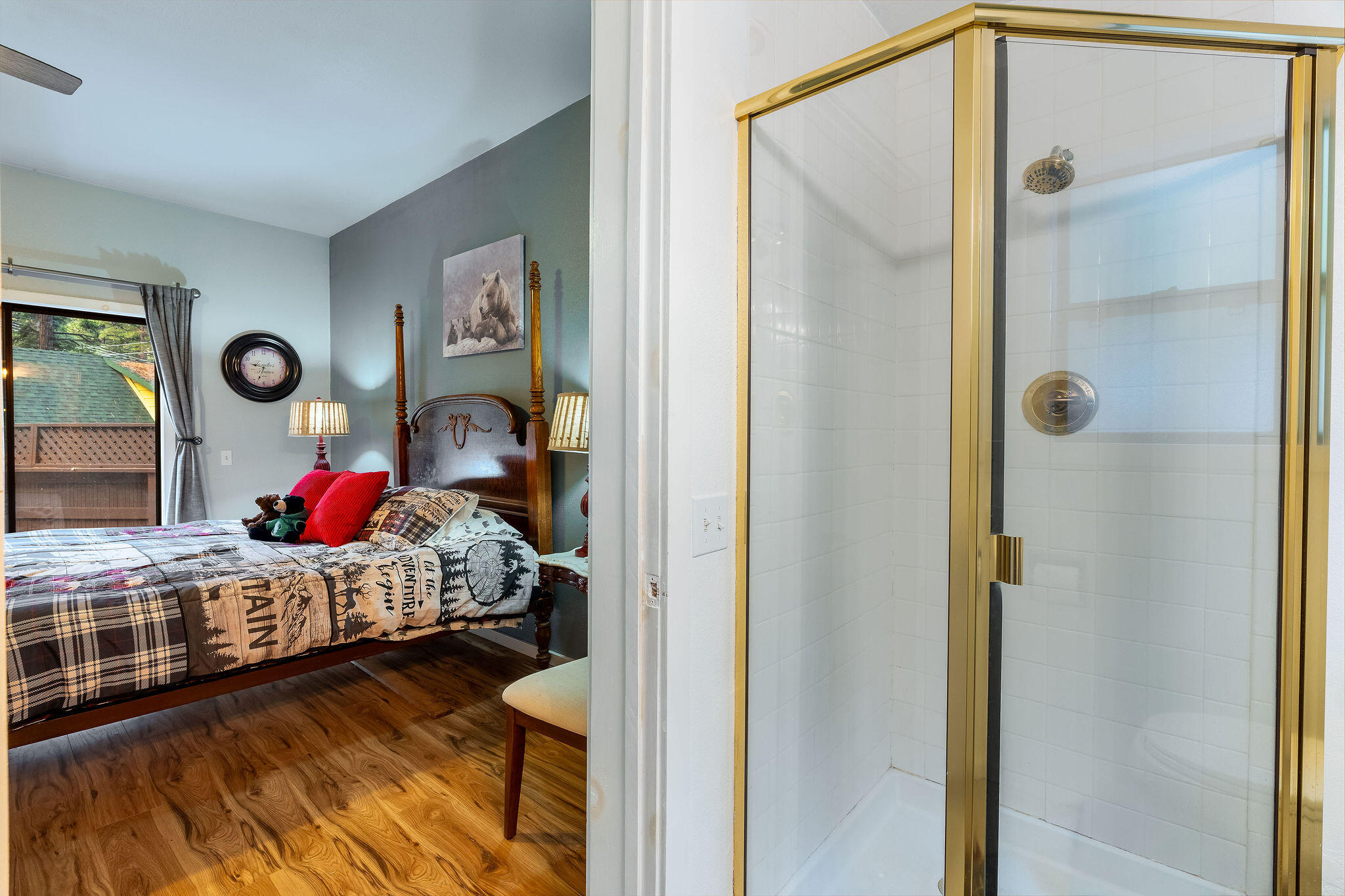 52515 Sunset Drive Idyllwild, CA 92549 - Photo 26 of 42 a bedroom with a bed and walk in closet