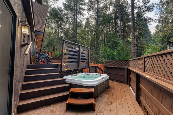 a backyard of a house with seating space and trees
