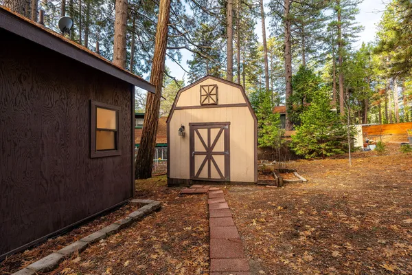 a house with trees in the background