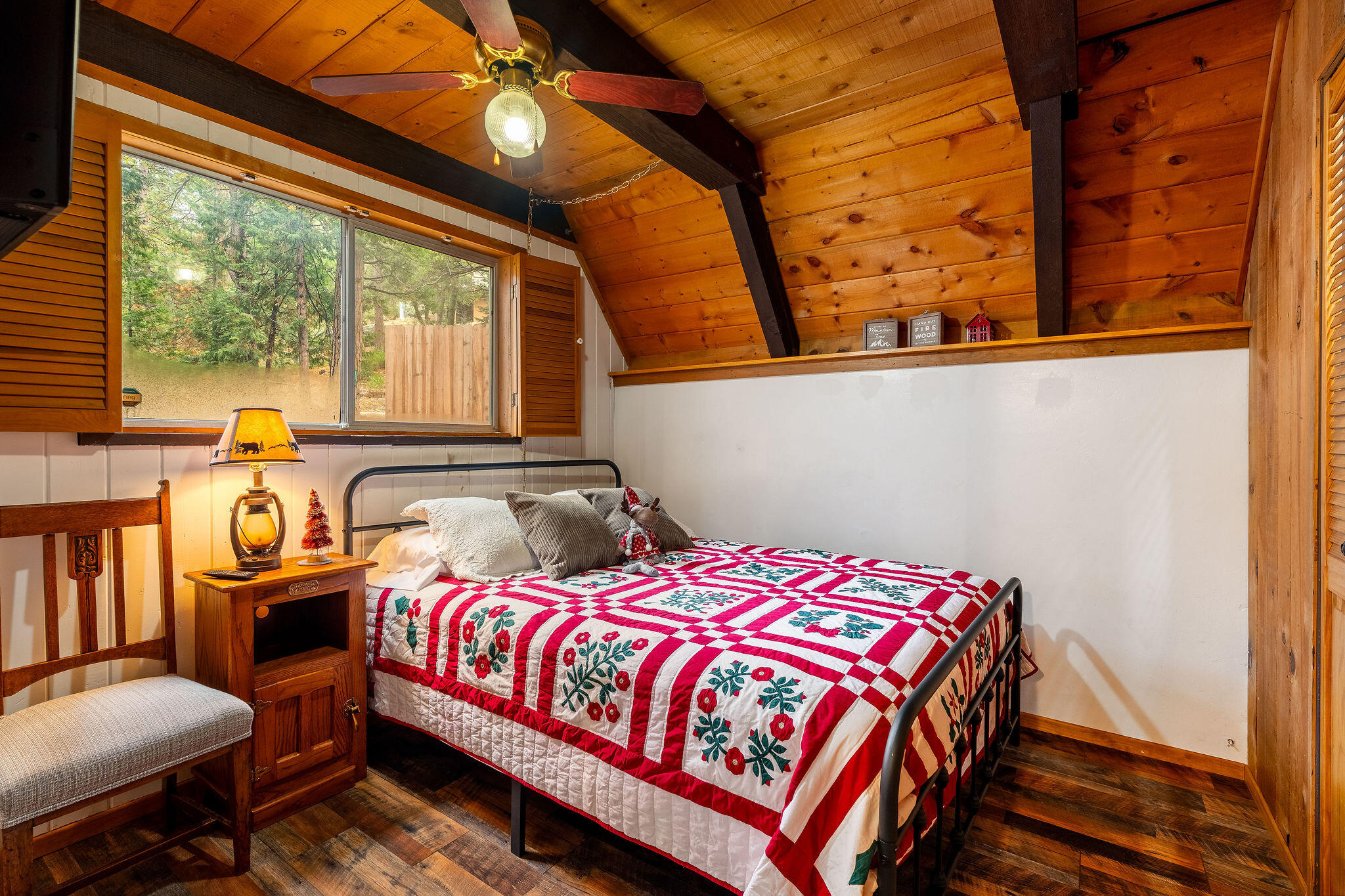 52515 Sunset Drive Idyllwild, CA 92549 - Photo 7 of 42 a bedroom with a bed and wooden floor