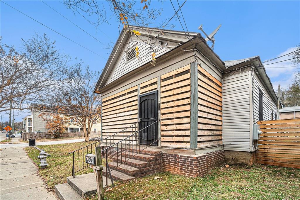 56 Ormond Street Southeast Atlanta, GA 30315 - Photo 1 of 15 a view of a house with a yard