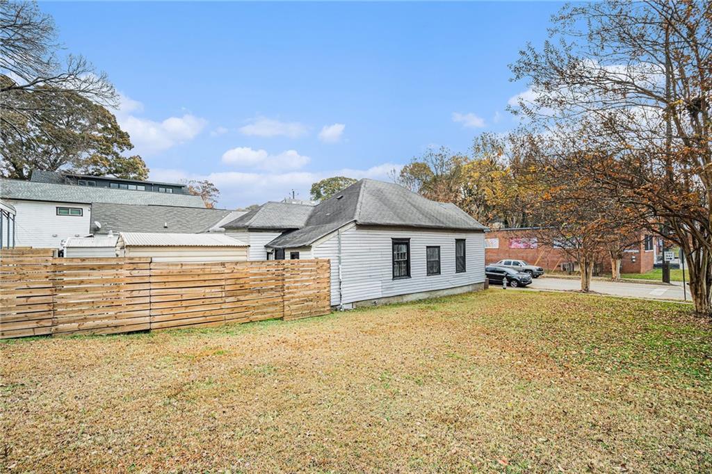 56 Ormond Street Southeast Atlanta, GA 30315 - Photo 15 of 15 front view of a house with a yard