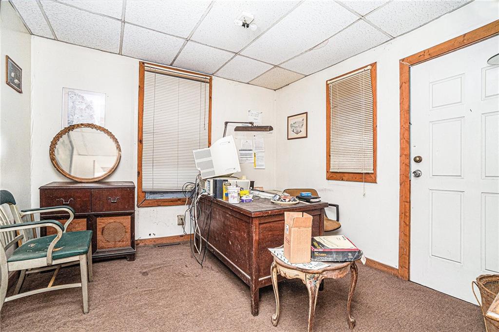 56 Ormond Street Southeast Atlanta, GA 30315 - Photo 6 of 15 a living room with furniture a window entryway and wooden floor
