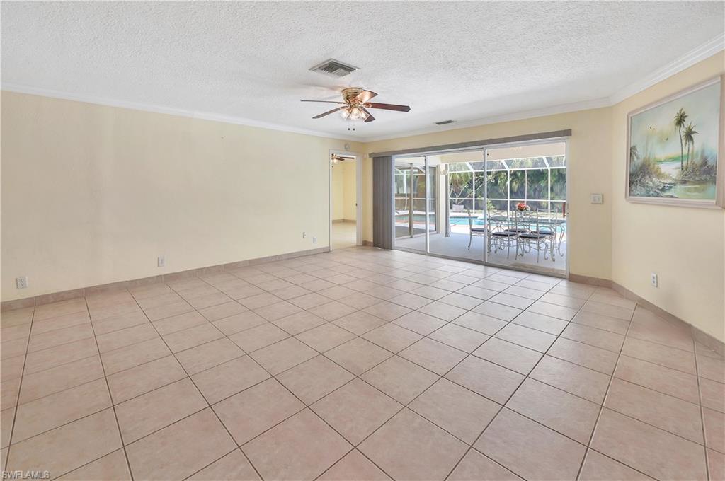 639 Pompano Drive Naples, FL 34110 - Photo 17 of 39 a view of an empty room with a window