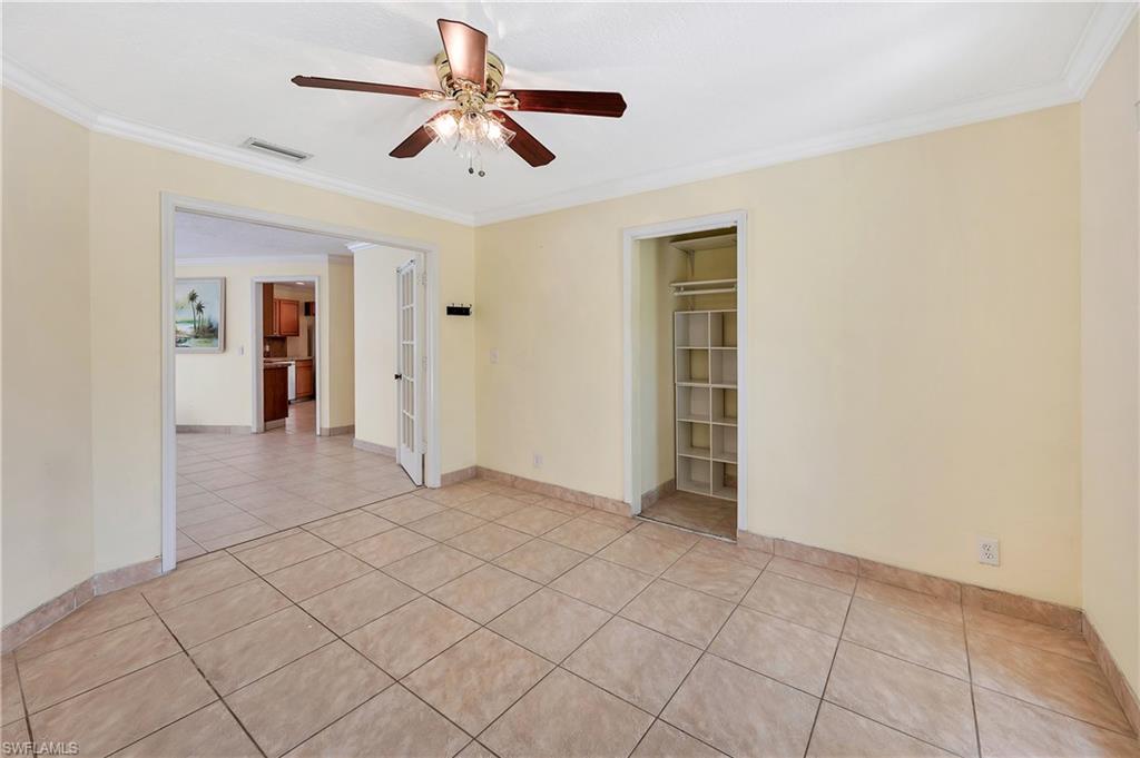 639 Pompano Drive Naples, FL 34110 - Photo 20 of 39 wooden floor in an empty room