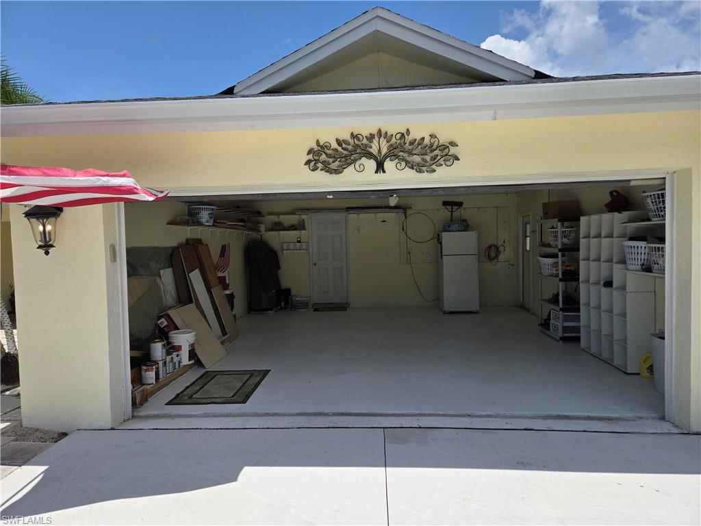 639 Pompano Drive Naples, FL 34110 - Photo 2 of 39 a view of a storage & utility room