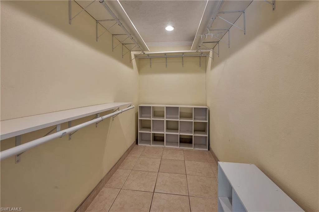 639 Pompano Drive Naples, FL 34110 - Photo 30 of 39 a view of an empty walk in closet