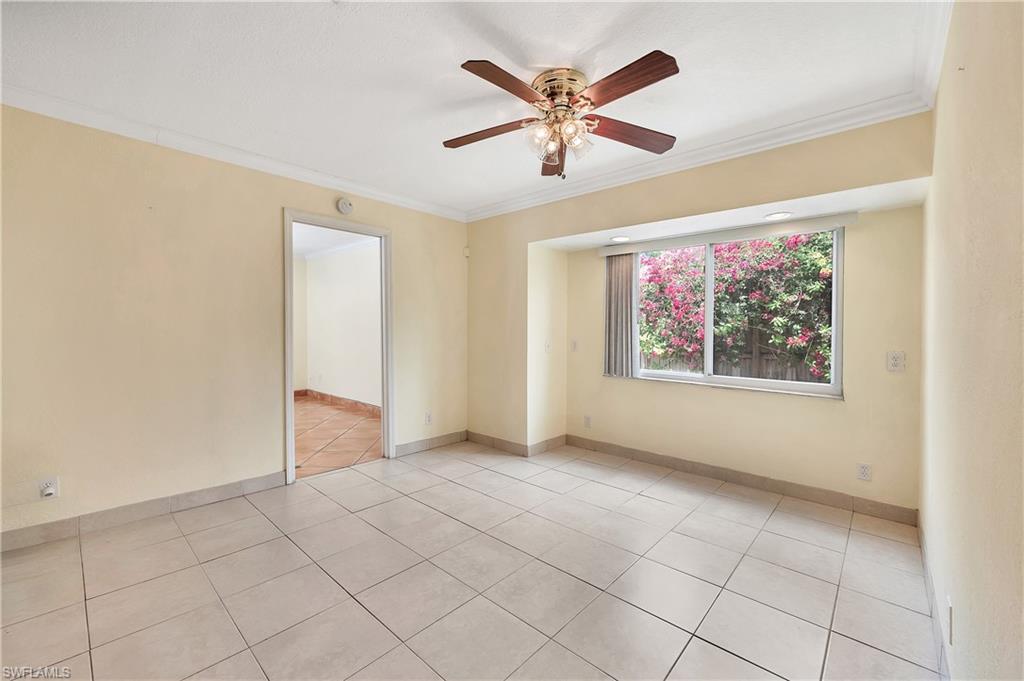 639 Pompano Drive Naples, FL 34110 - Photo 34 of 39 a view of an empty room with a window