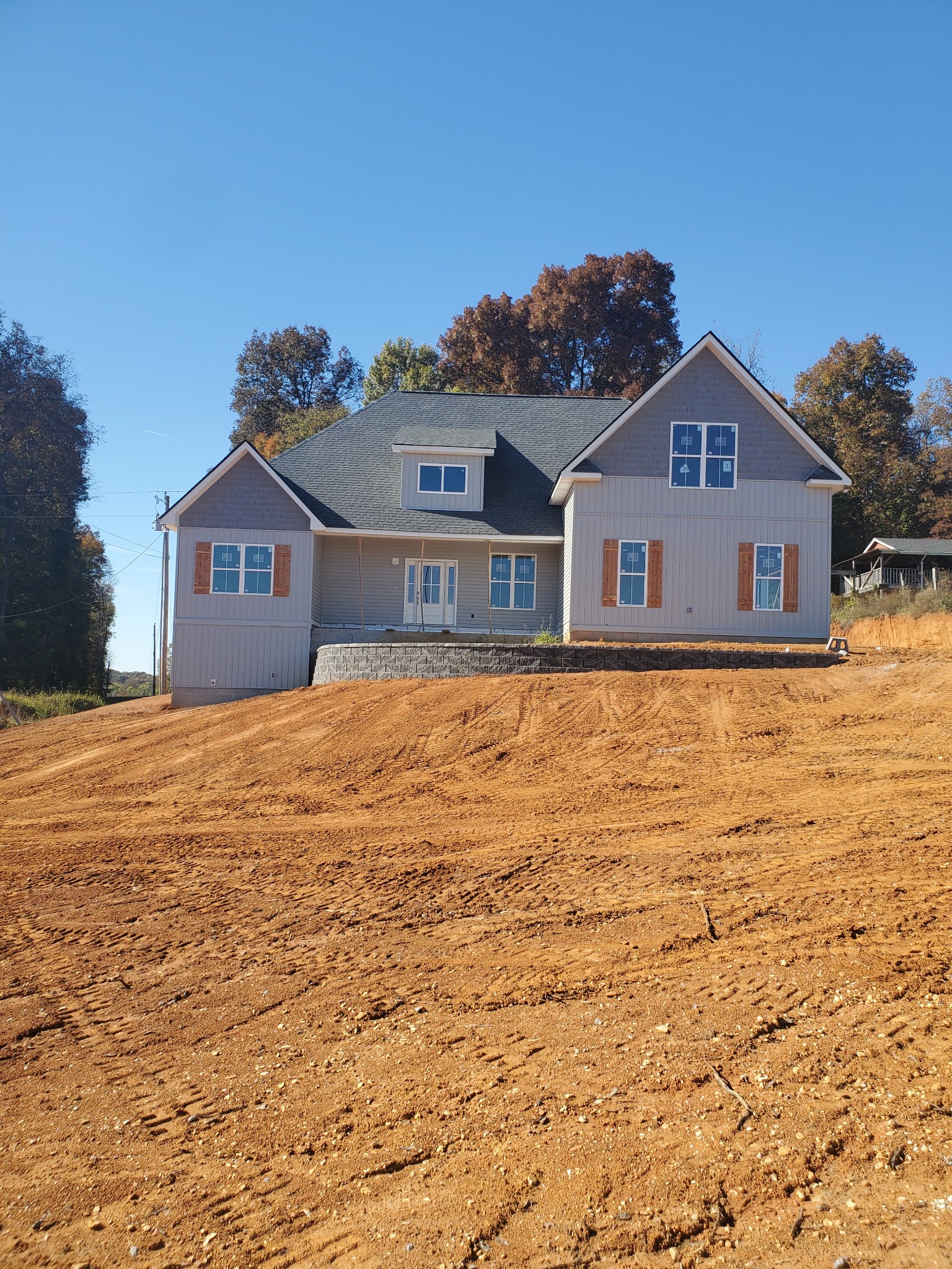 2452 Canoe Branch Road Lebanon, TN 37087 - Photo 1 of 1 a front view of a house with a yard