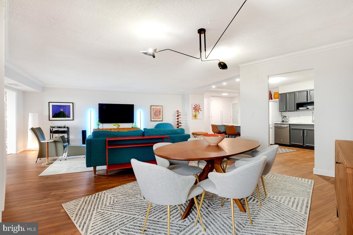 5901 Mt Eagle Drive, Unit 1604 Alexandria, VA 22303 - Photo 12 of 39 Dining Room - Living Room Left/Kitchen Right