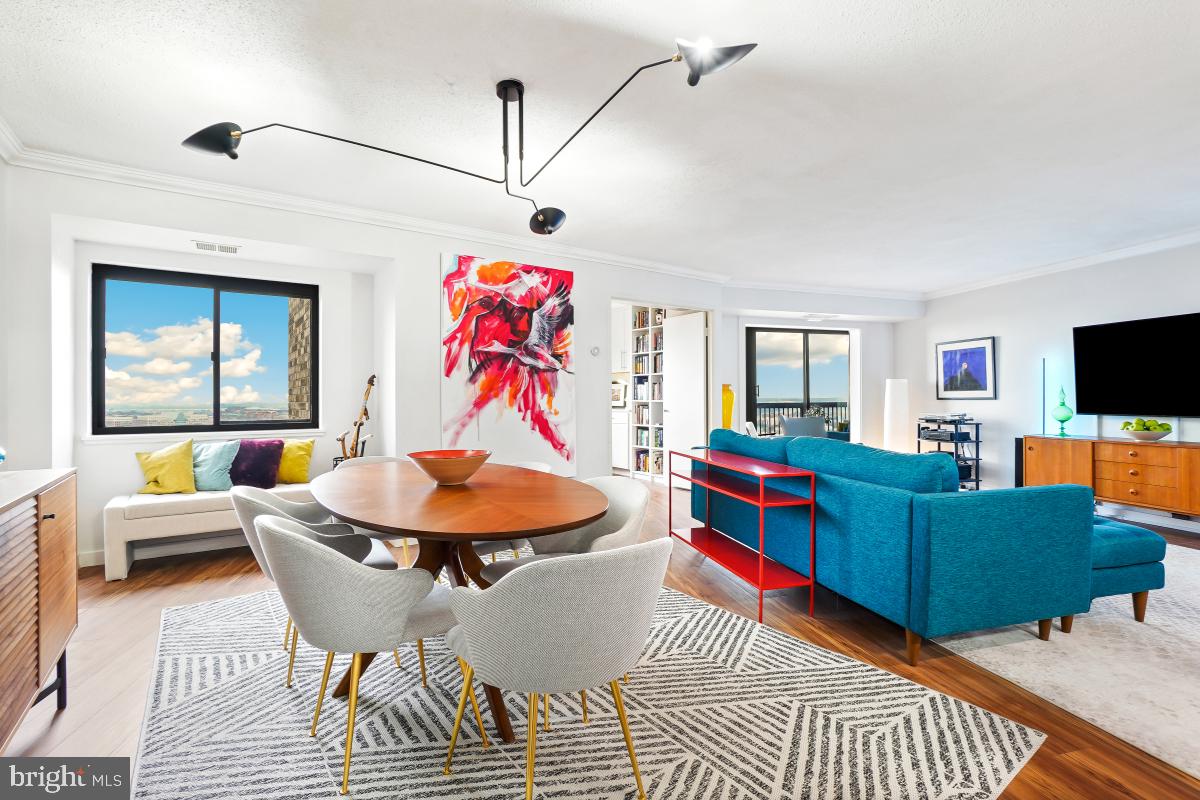 5901 Mt Eagle Drive, Unit 1604 Alexandria, VA 22303 - Photo 13 of 39 Dining Room Left and Living Room Right