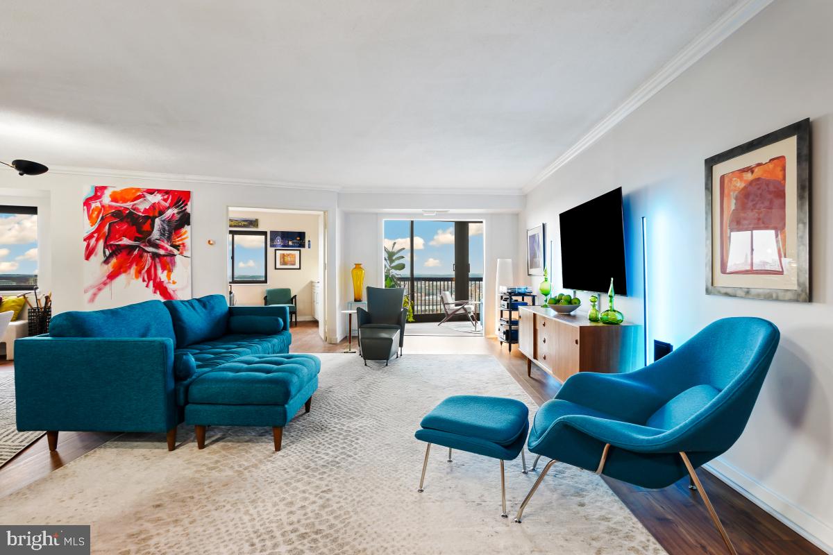 5901 Mt Eagle Drive, Unit 1604 Alexandria, VA 22303 - Photo 10 of 39 Living Room - Den Left/Sun Florida Room Right