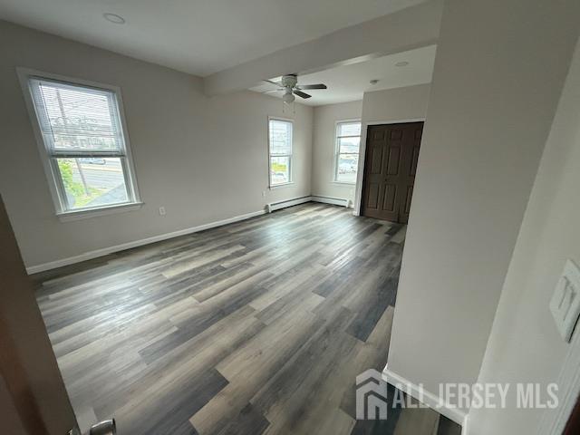 601 Ridgeway Avenue, Unit 2 South Amboy, NJ 08879 - Photo 5 of 9 a view of an empty room and window