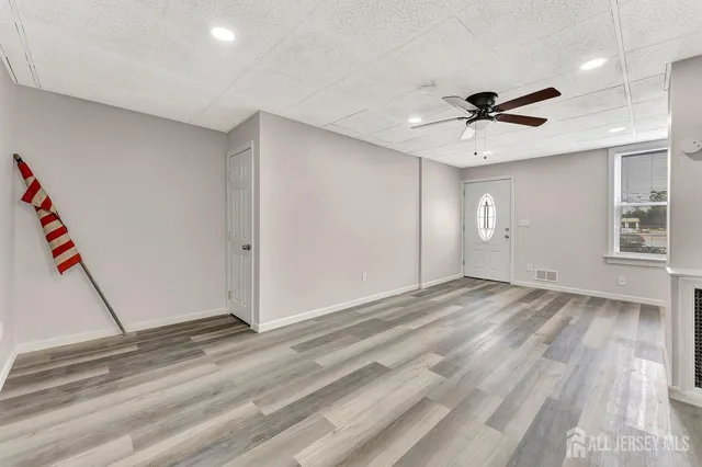 a view of an empty room and window