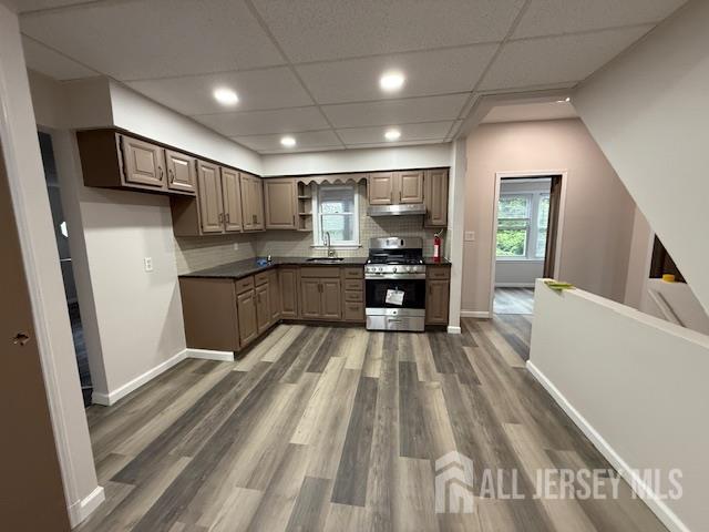 601 Ridgeway Avenue, Unit 2 South Amboy, NJ 08879 - Photo 7 of 9 a kitchen with stainless steel appliances a sink stove and refrigerator