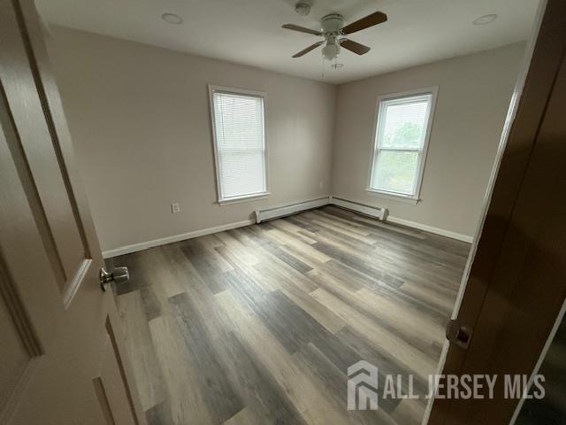 601 Ridgeway Avenue, Unit 2 South Amboy, NJ 08879 - Photo 9 of 9 a view of an empty room and a window