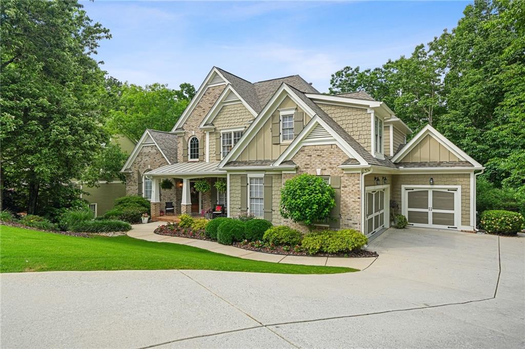 509 Crested Hawk Ridge Canton, GA 30114 - Photo 3 of 89 a view of a house with a yard and potted plants