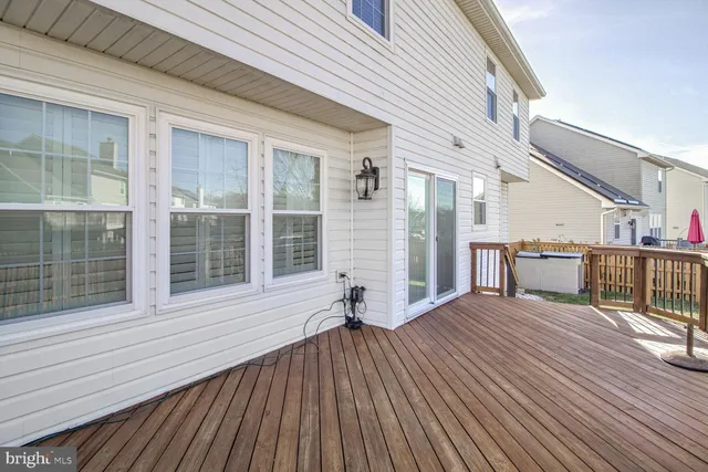a view of a house with wooden floor and iron stairs