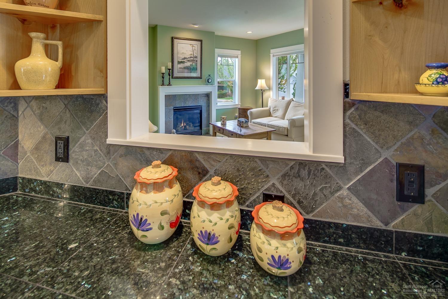 61209 Ridgewater Loop Bend, OR 97702 - Photo 13 of 25 Darling window connect the kitchen to th