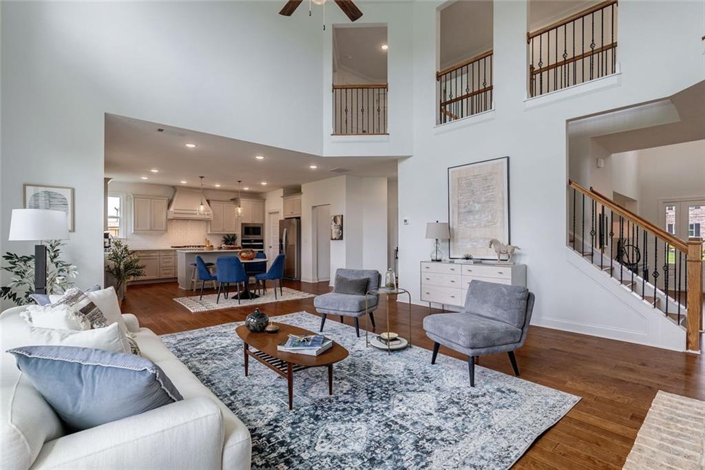 1025 Stonewood Field Road Watkinsville, GA 30677 - Photo 48 of 98 a living room with furniture and a rug