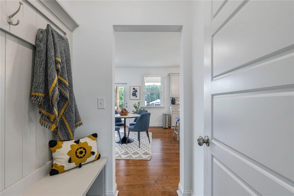 1025 Stonewood Field Road Watkinsville, GA 30677 - Photo 60 of 98 a view of living room filled with furniture and a window