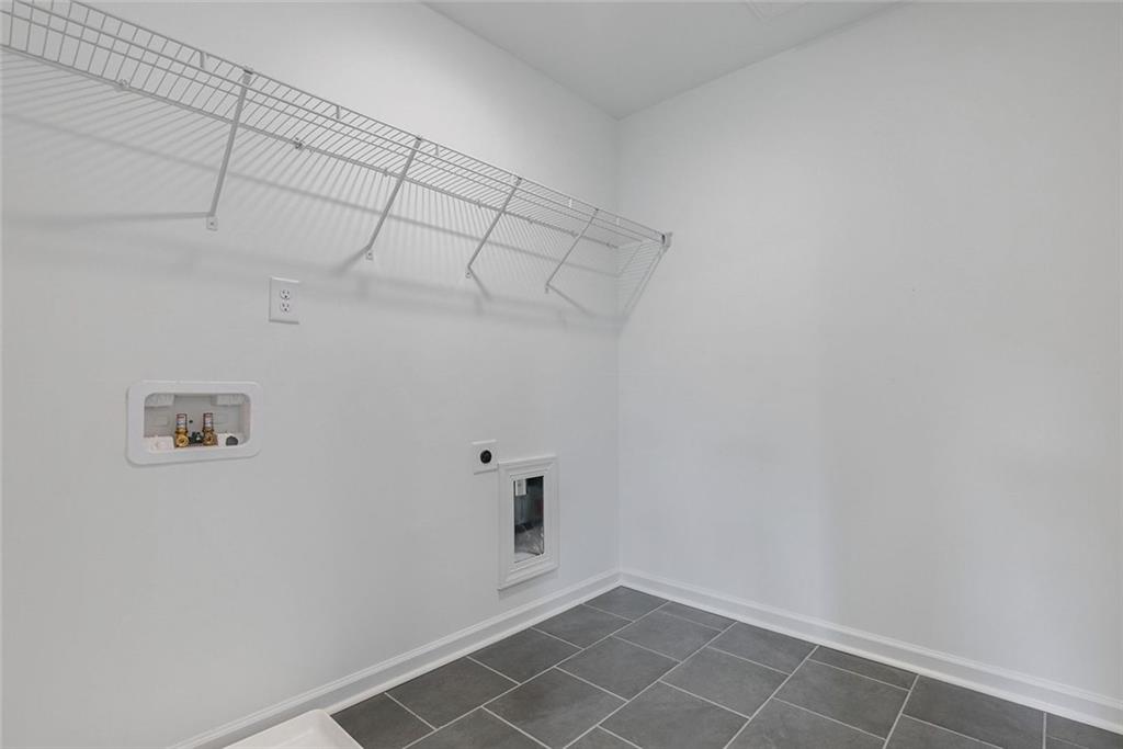 1025 Stonewood Field Road Watkinsville, GA 30677 - Photo 77 of 98 a view of a room with racks on the wall