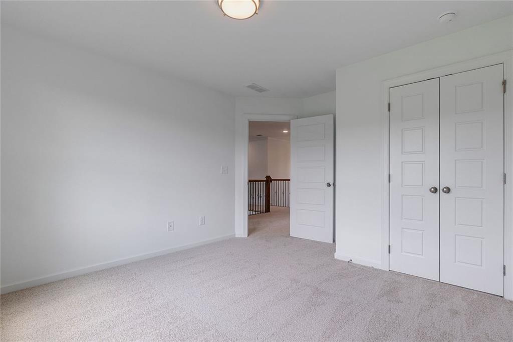 1025 Stonewood Field Road Watkinsville, GA 30677 - Photo 87 of 98 a view of an empty room and closet area