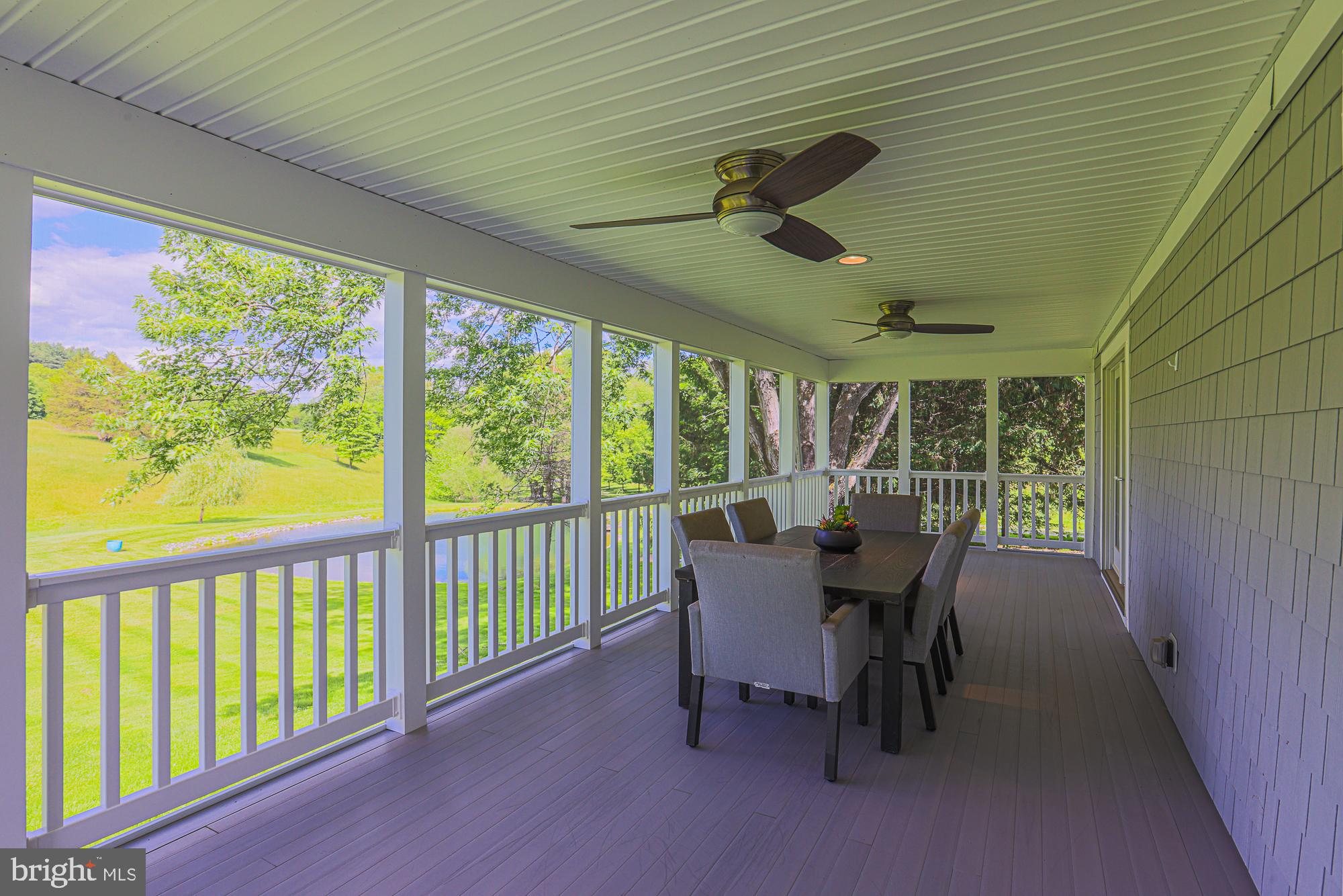 19020 Gunpowder Road Hampstead, MD 21074 - Photo 86 of 109 Side screened porch w/CF