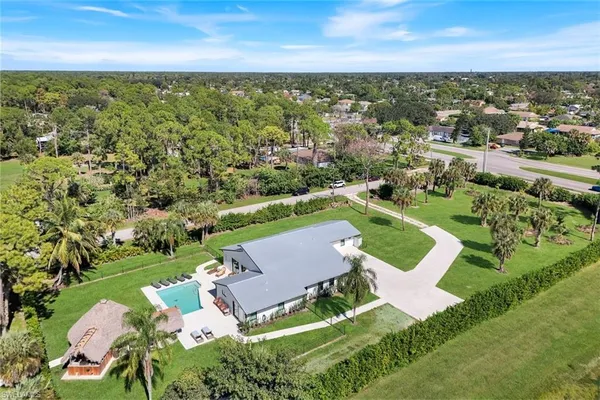 an aerial view of a house with garden space and outdoor space