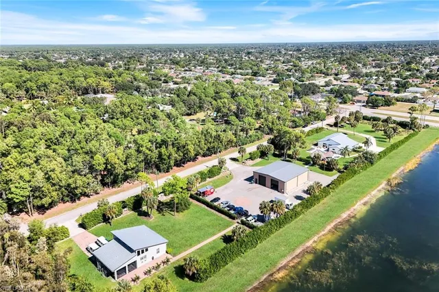 an aerial view of a house with a garden