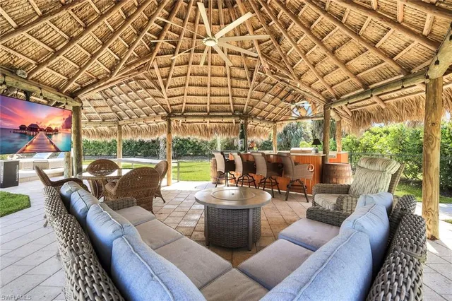 a outdoor space with patio lots of furniture and garden view