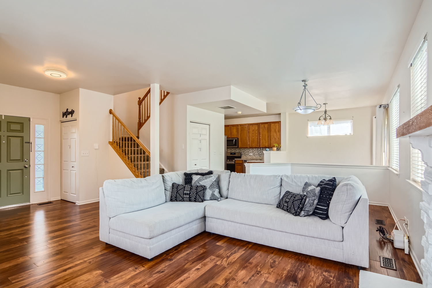 487 West Hamlin Lane Round Lake, IL 60073 - Photo 11 of 28 a living room with furniture and a wooden floor