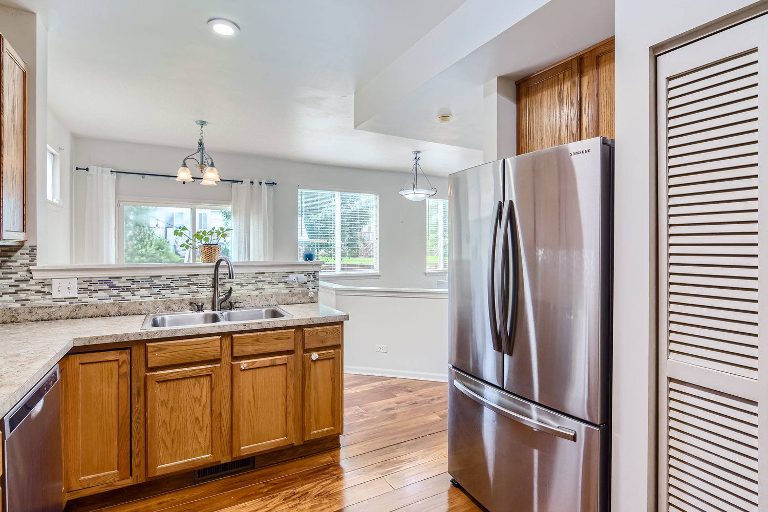 487 West Hamlin Lane Round Lake, IL 60073 - Photo 15 of 28 a kitchen with stainless steel appliances granite countertop a refrigerator and a sink