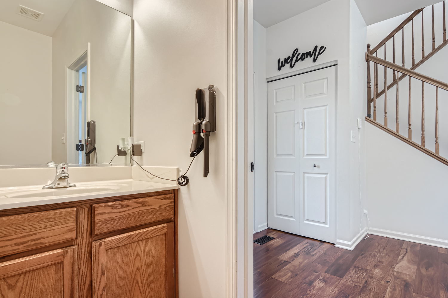 487 West Hamlin Lane Round Lake, IL 60073 - Photo 20 of 28 a bathroom with a sink and a mirror