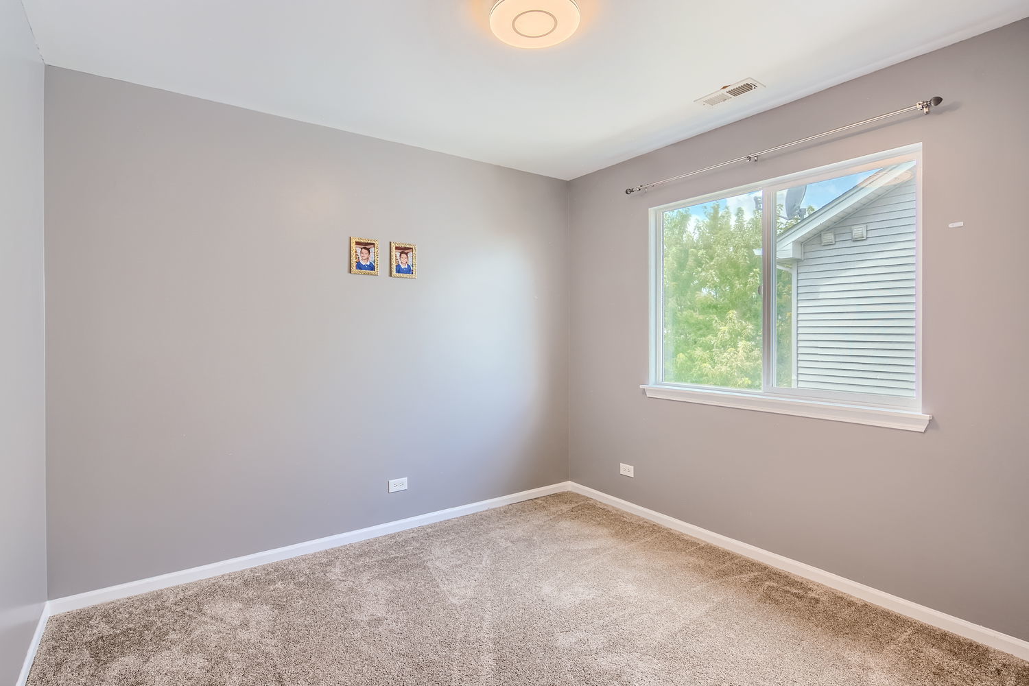 487 West Hamlin Lane Round Lake, IL 60073 - Photo 25 of 28 a view of a livingroom with a window