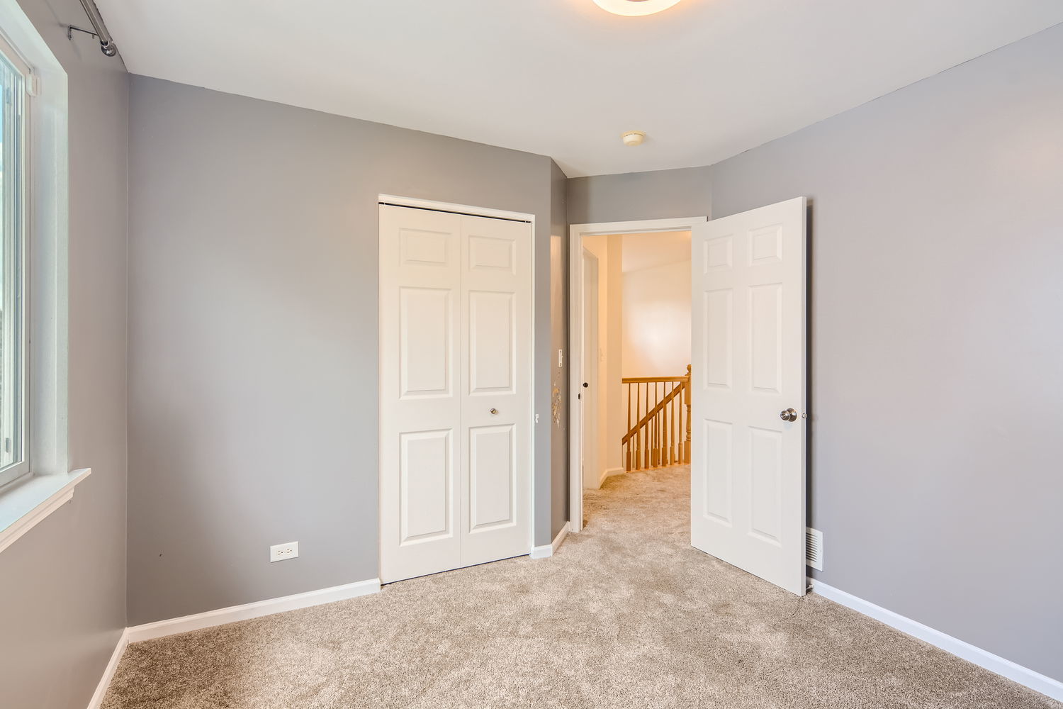 487 West Hamlin Lane Round Lake, IL 60073 - Photo 26 of 28 an empty room with a bathroom and a window