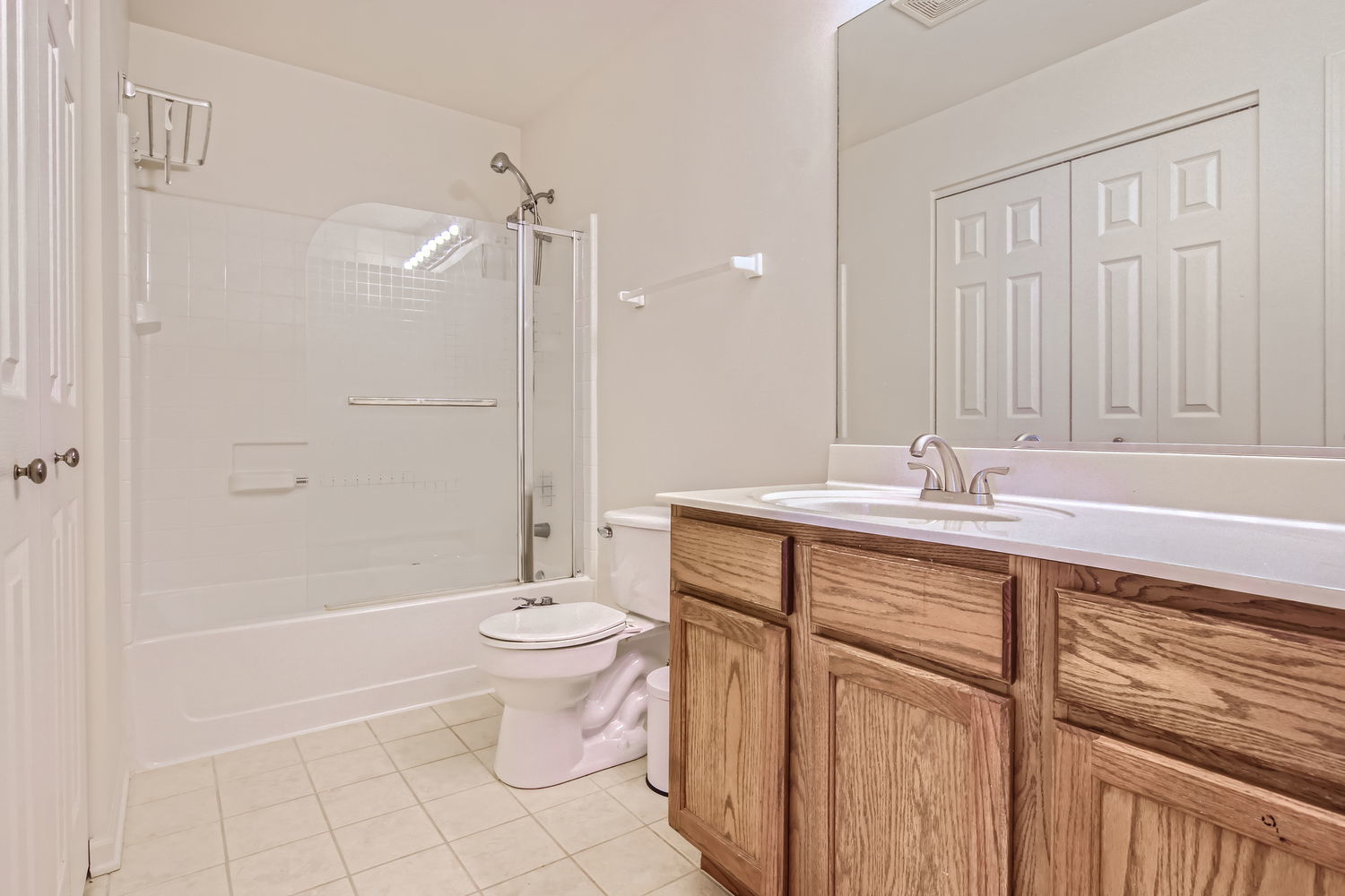 487 West Hamlin Lane Round Lake, IL 60073 - Photo 28 of 28 a bathroom with a double vanity sink toilet and shower